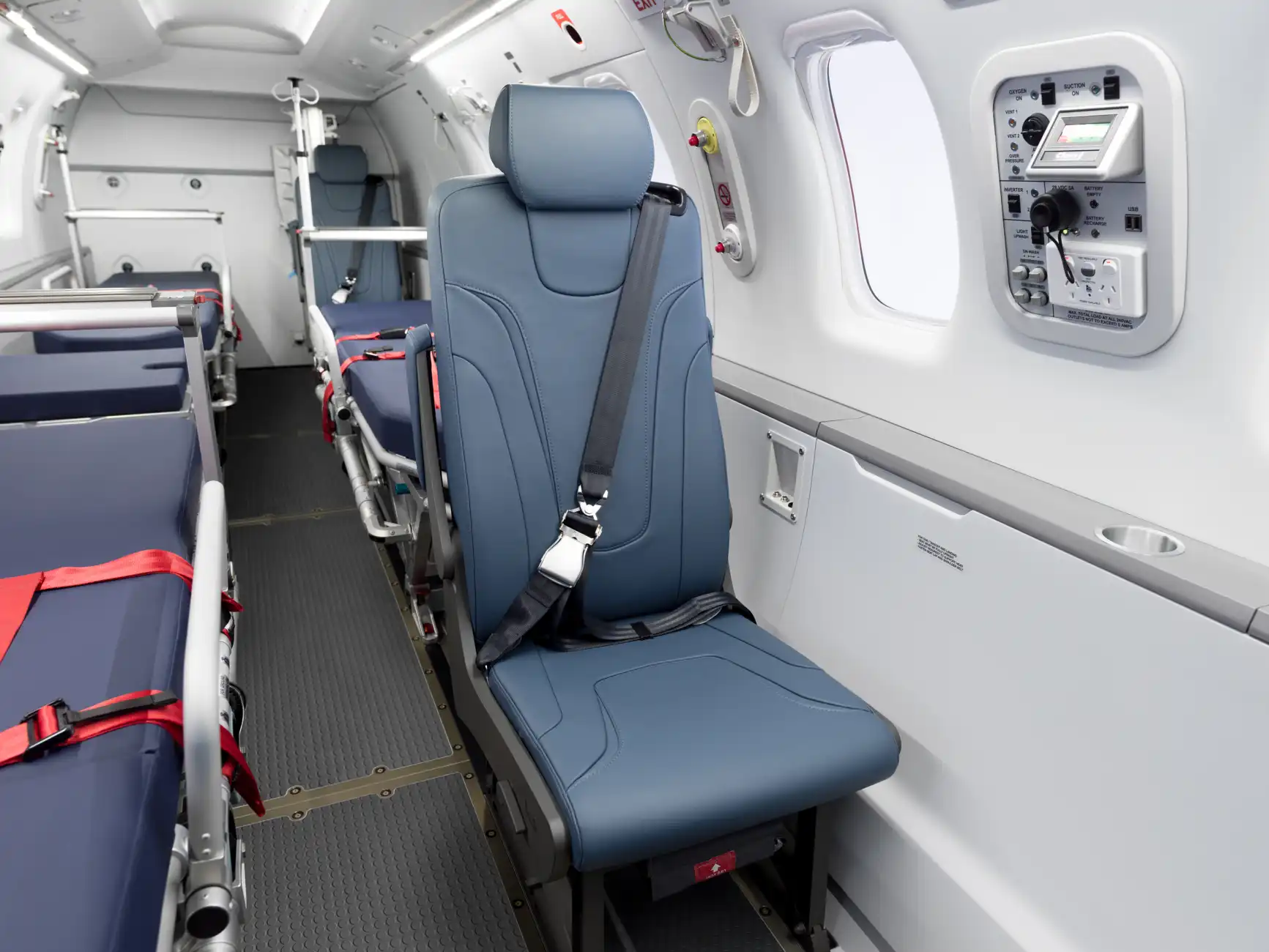 The interior of a PC-24 Air Ambulance. The space is equipped with medical gear